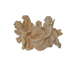 A. Santini cherub wall plaque holy water font